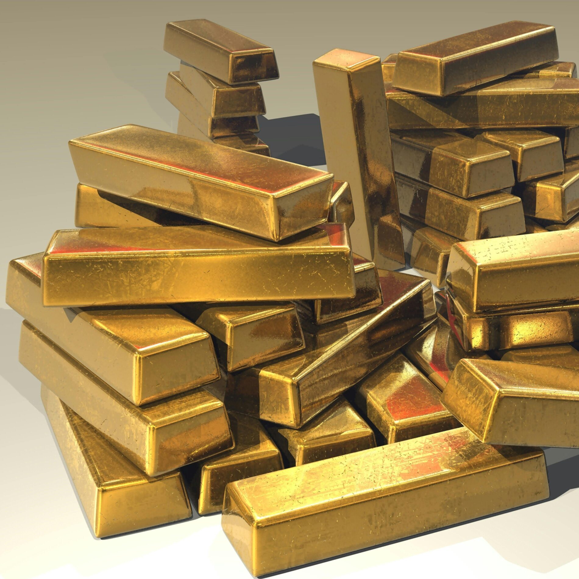 A pile of lustrous gold bars symbolizing wealth and prosperity.